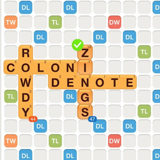 WWF game with the words colon, rowdy, and denote played on the board. The word &quot;zings&quot; is added, showing an example of utilizing bonus tiles.